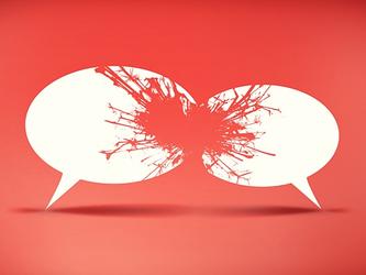 Two speech bubbles in conflict